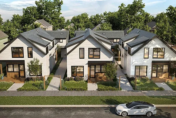 Aerial view of residential homes, showcasing a desirable neighborhood with attractive real estate opportunities.